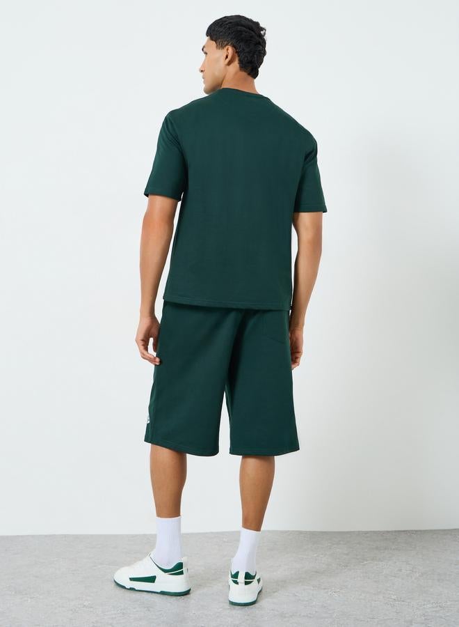 ستايلي طقم منسق من تيشيرت وشورت بطبعة جرافيك للرجال - Image 4